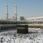 Thousands of pilgrims surround the Kaaba in Mecca, showcasing Islamic unity and devotion.