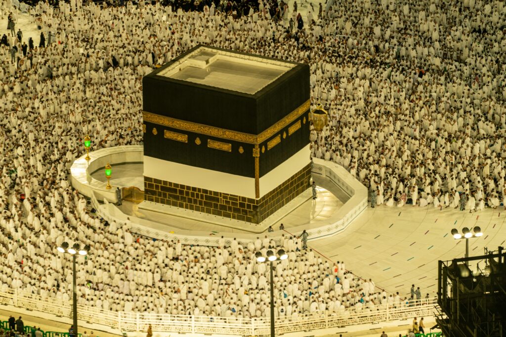 Aerial view of the Kaaba in Mecca, Saudi Arabia, with thousands of pilgrims during Hajj season.