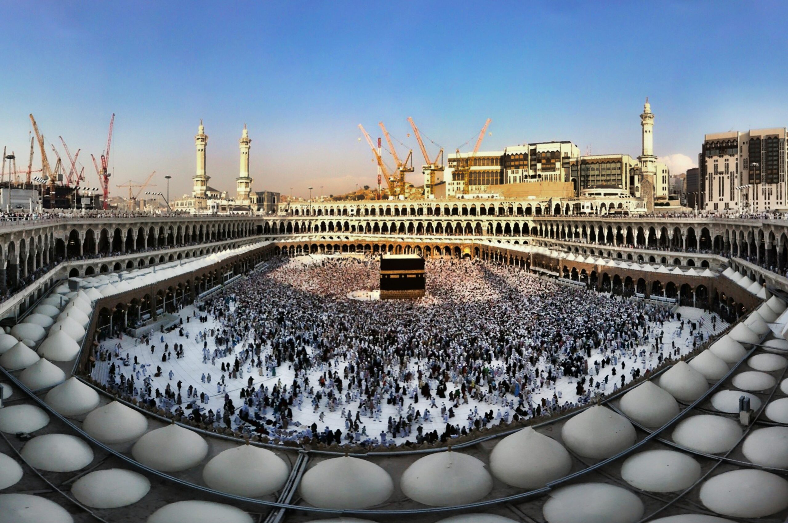 Crowded pilgrims performing Tawaf around the Kaaba in Mecca, Saudi Arabia during Hajj.